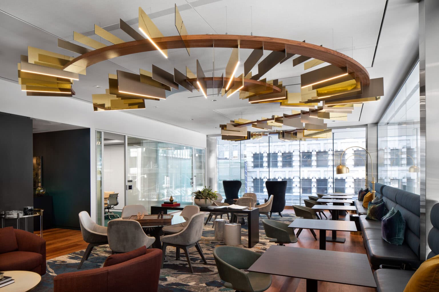 Deloitte Podium Club interior featuring suspended sculptural element.