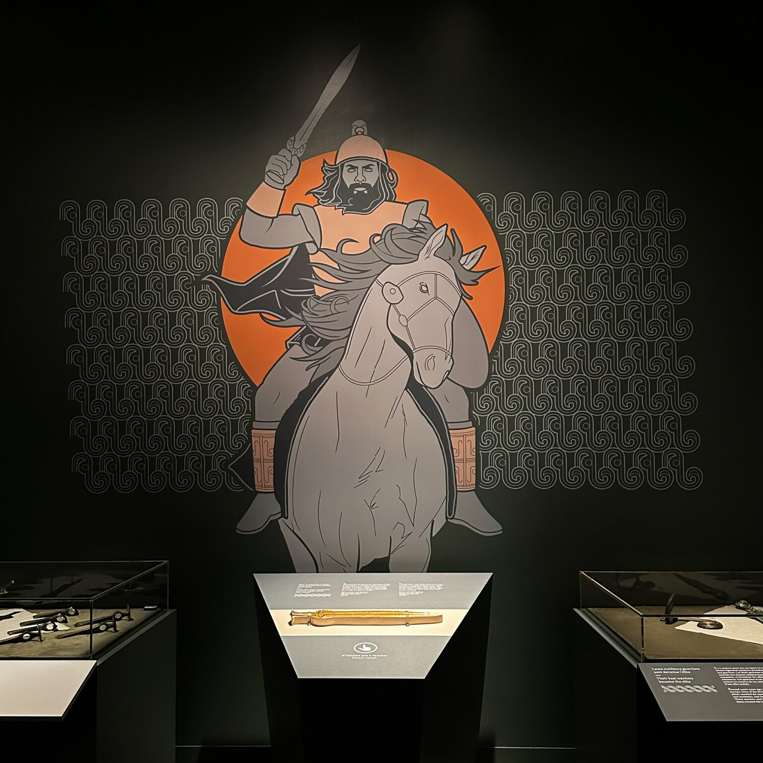 Canadian Museum of History First Royals of Europe exhibit featuring large-scale wall illustration of a sword-wielding warrior on a horse.