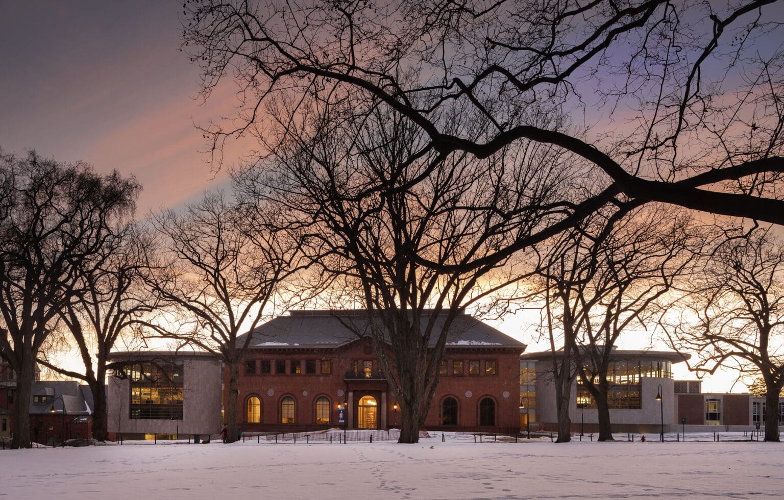 Neilson Library exterior at dusk during winter