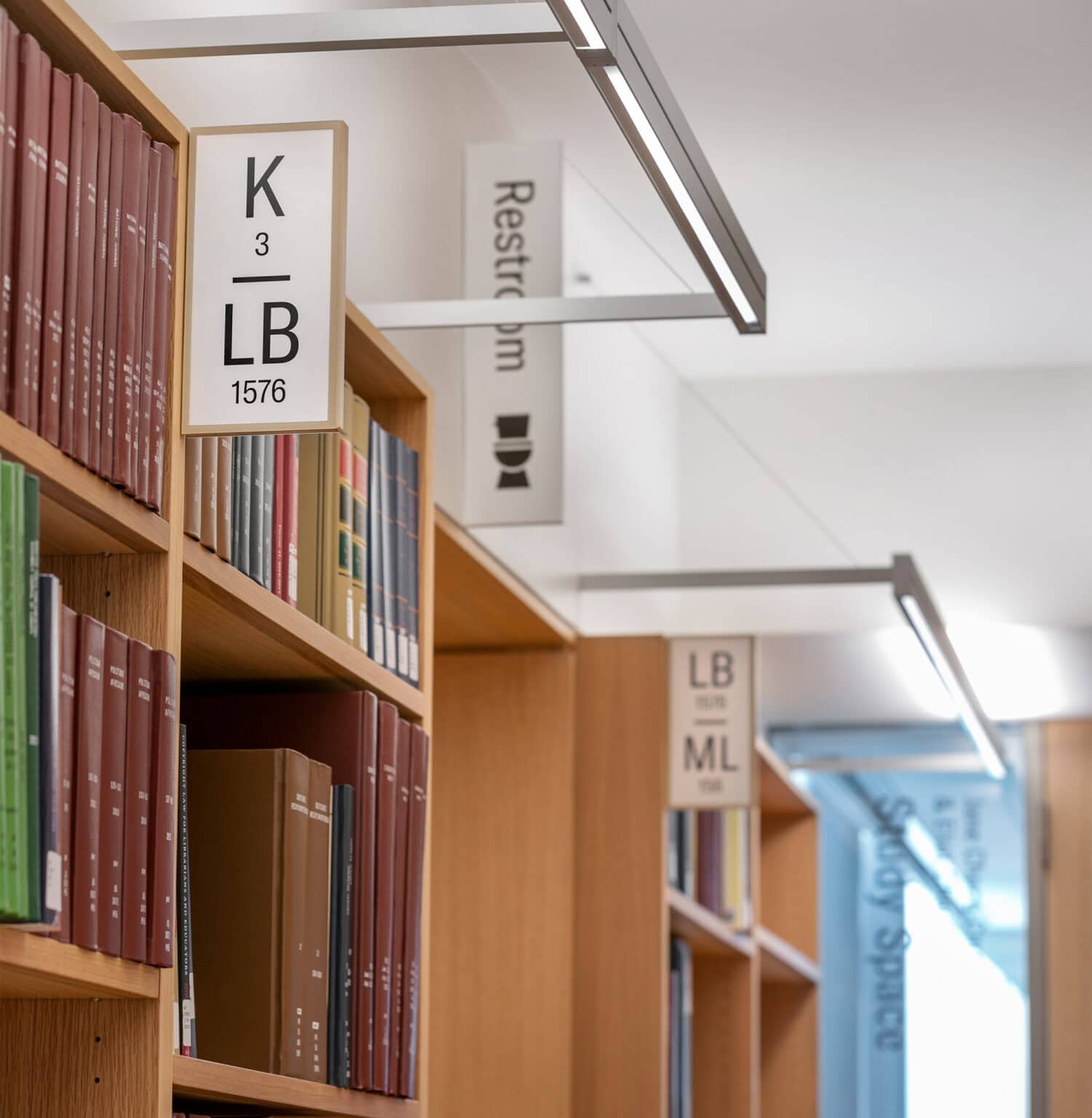Neilson Library projecting sign on stacks, with removable insert