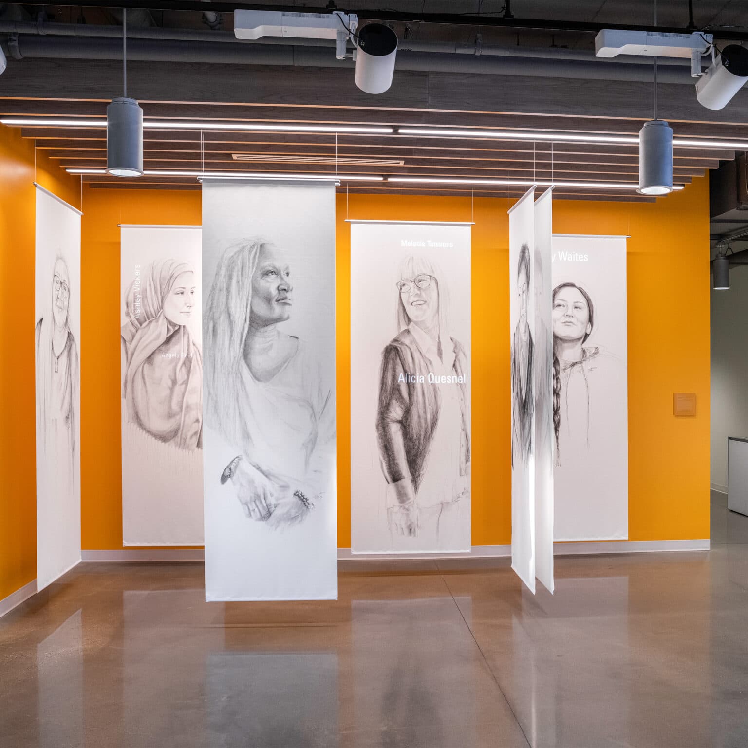 A series of portraits representing various ages and ethnicities of women who use or work at the YWCA. Artist Credit: Janice Tanton, In Conversation with Myself and My Sisters, 2019.
