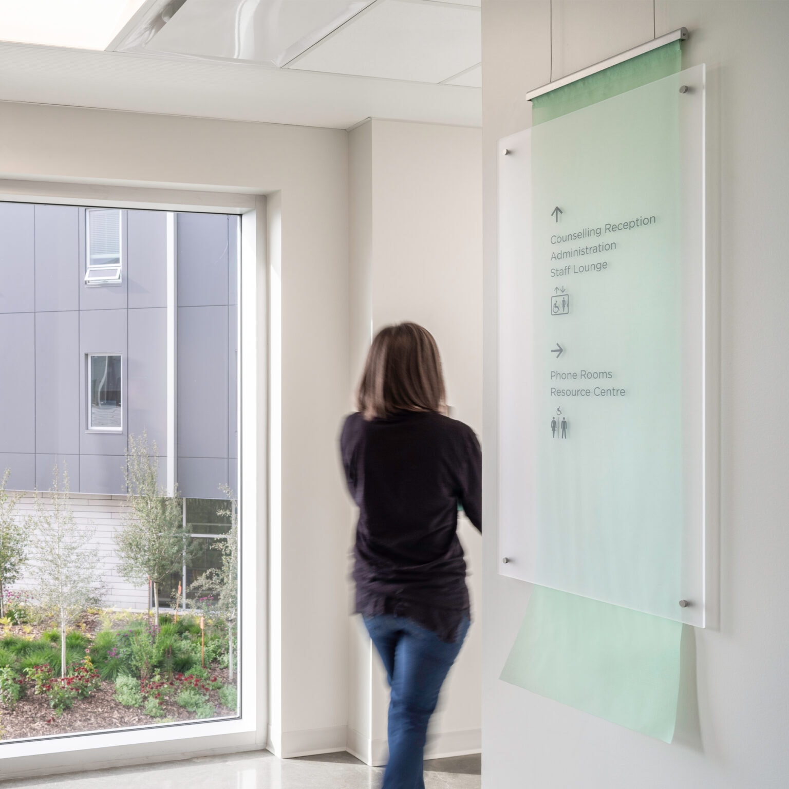 Wall-mounted directional signage.