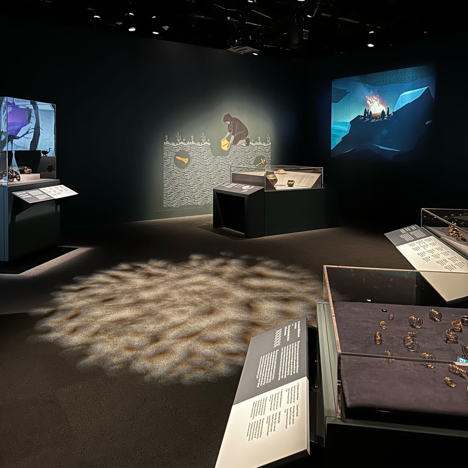 Canadian Museum of History First Royals of Europe exhibition area featuring an illustration, display casings and projections.